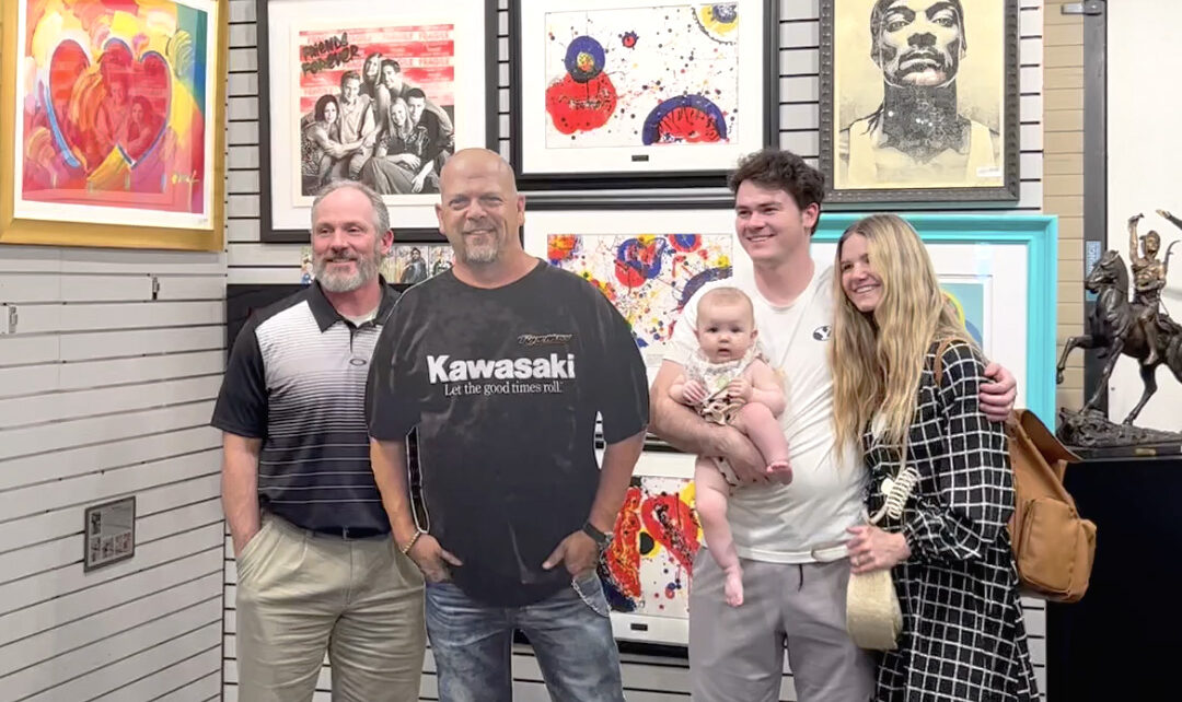 Family posing with Rick Harrison